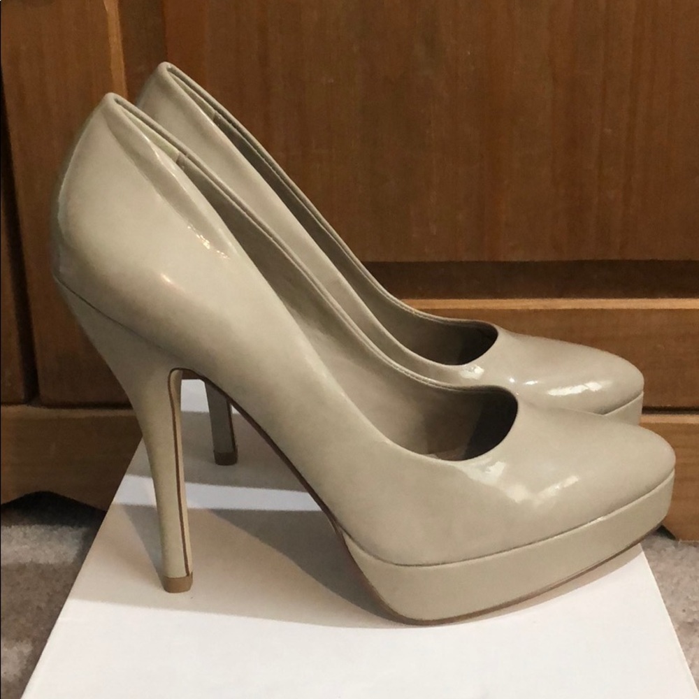 Nude, platform pumps. NEVER WORN